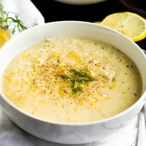 Avgolemono Soup - Classic Greek lemon-egg soup with rice — creamy, comforting, and delicious
