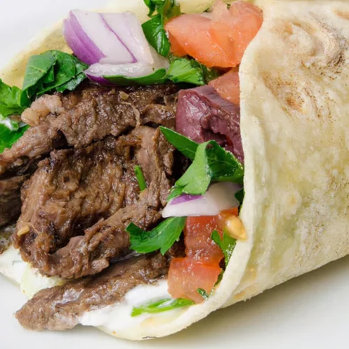 Beef Wrap - Seasoned beef wrapped in warm pita with fresh toppings