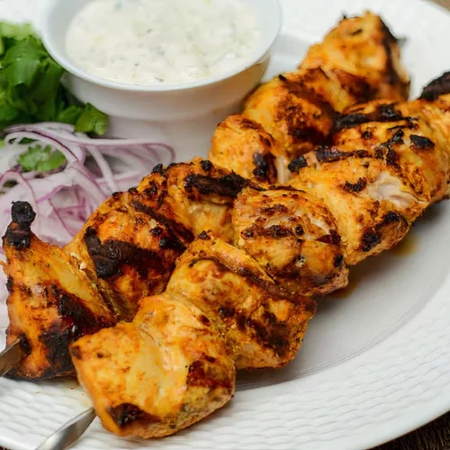 Chicken Kebab Platter - Grilled chicken kebabs served with rice, salad, and pita